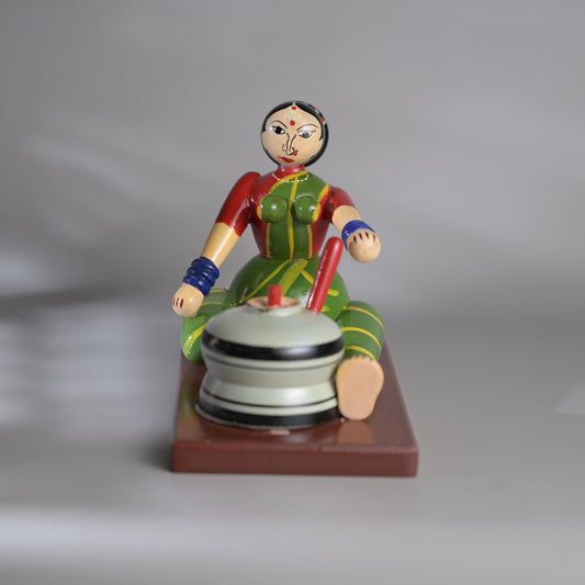 Village scene - Grinding grains