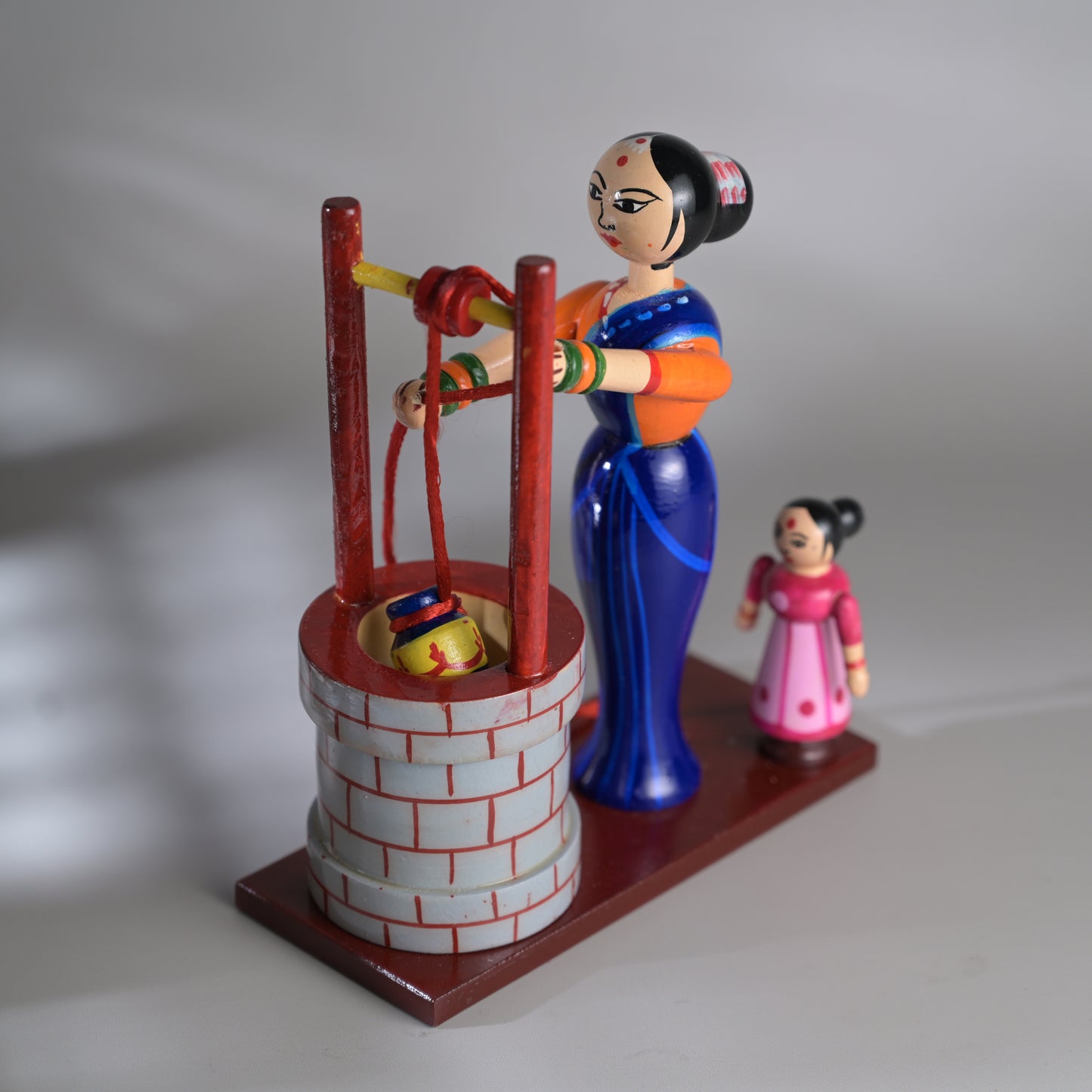 Village scene - Drawing water