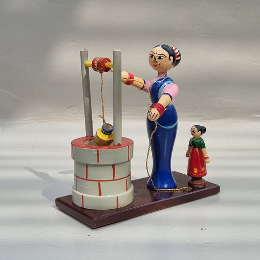 Village scene - Drawing water