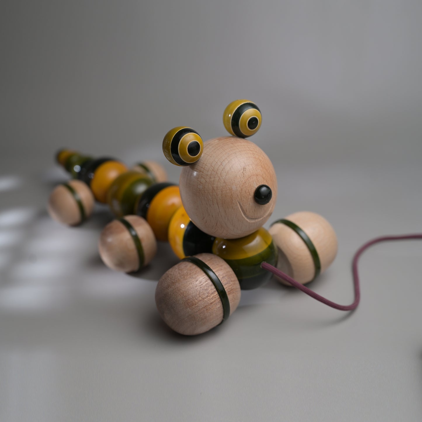 WIGGLES the caterpillar pull toy