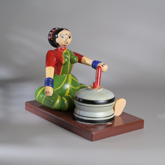 Village scene - Grinding grains