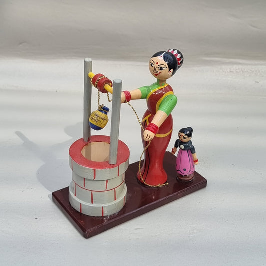 Village scene - Drawing water